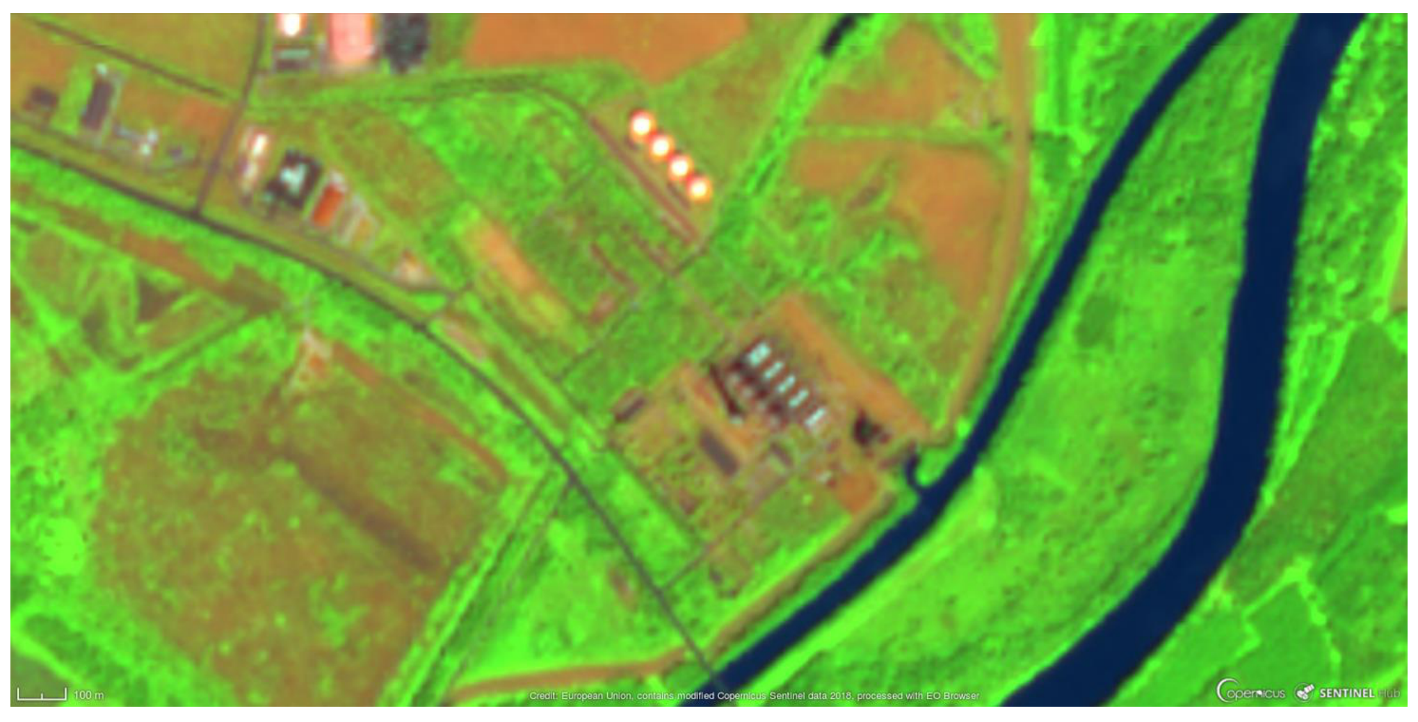 False-colour Sentinel-2 satellite image of the Tiszaújváros power plant area with the Tisza river, taken on 29 June 2018; short shadows, scale bar 100 m lower left.